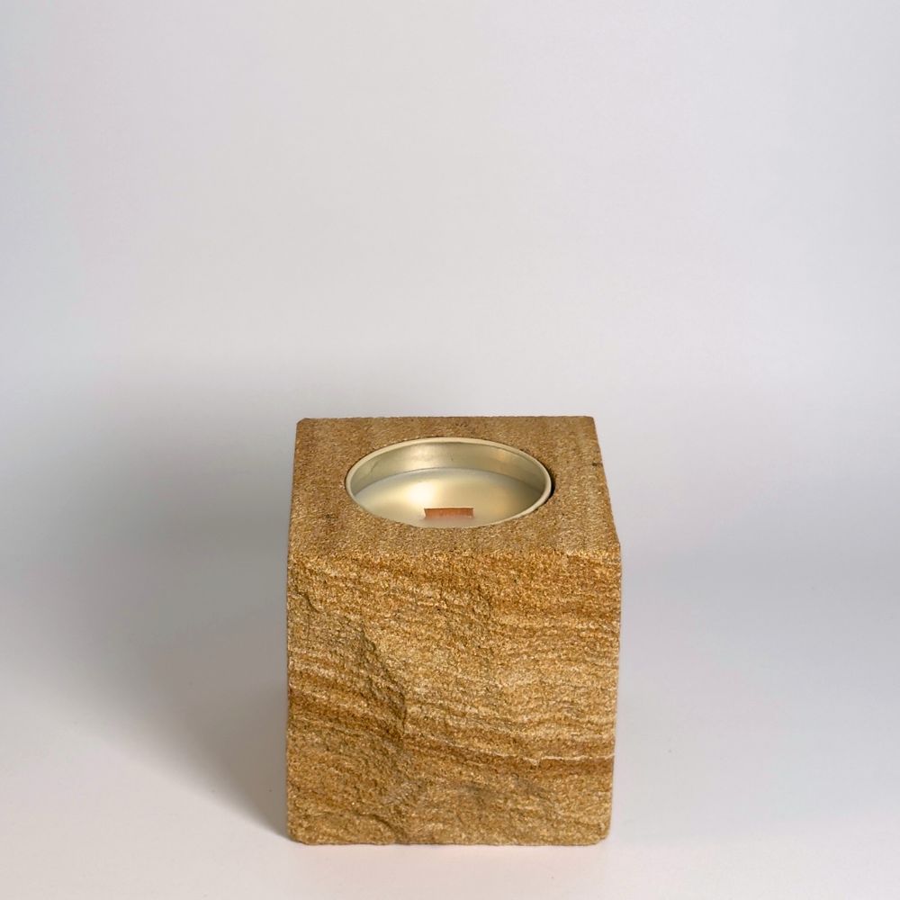 Banded 2 rck. refillable sandstone candle with rock faced side shown on the front