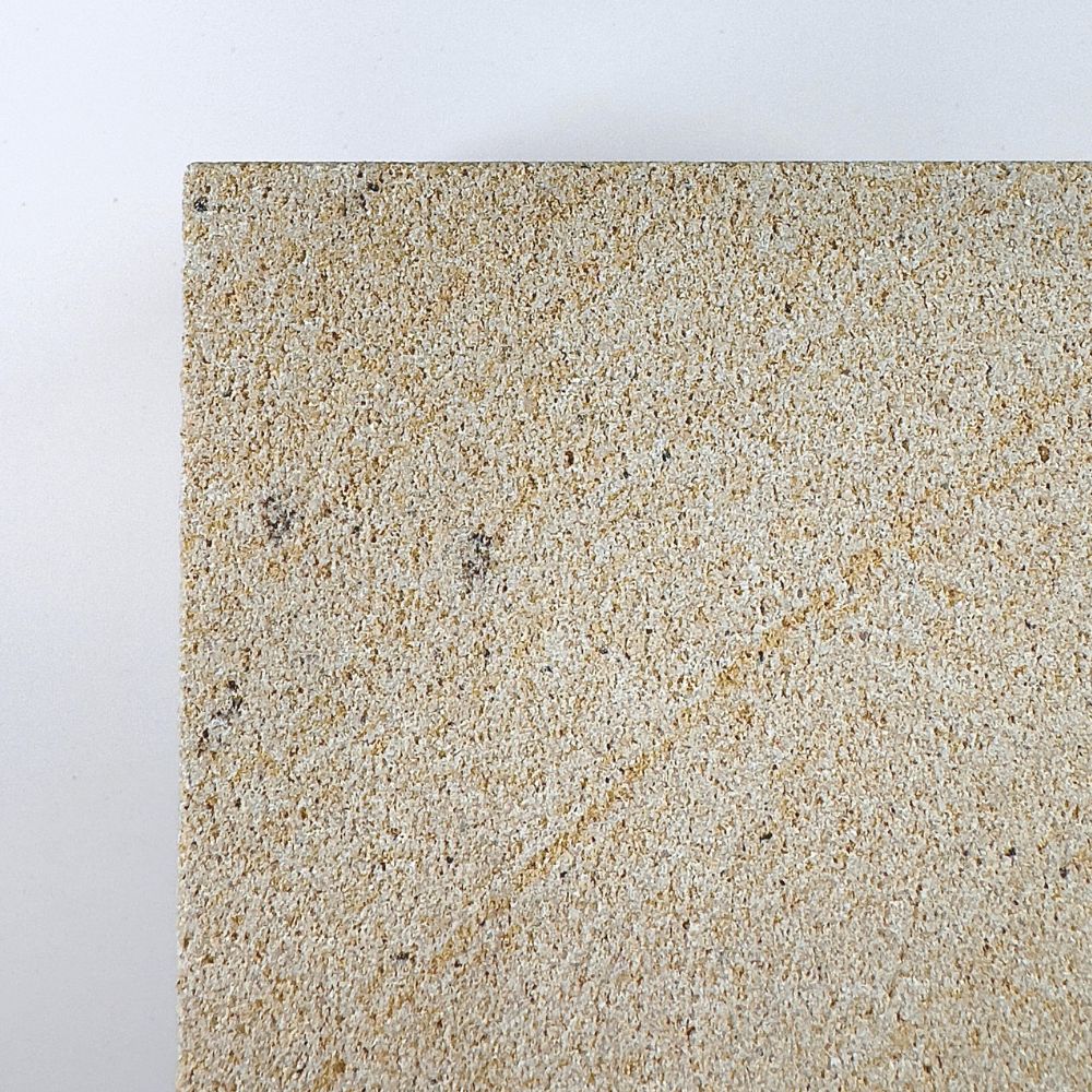 White rck. refillable sandstone candle, side face close up of the sandstone