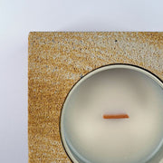 Banded 1 rck. refillable sandstone candle, top face close up of the sandstone and soy candle