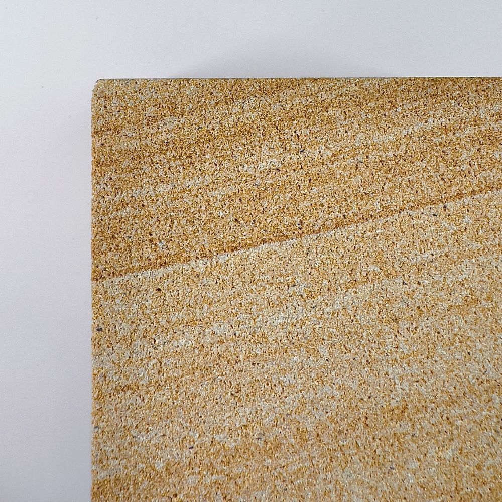 Banded 2 rck. refillable sandstone candle, side face close up of the sandstone