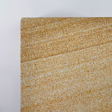 Banded 2 rck. refillable sandstone candle, side face close up of the sandstone