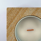 Banded 2 rck. refillable sandstone candle, top face close up of the sandstone and soy candle