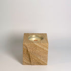 Beige 1 rck. refillable sandstone candle with rock faced side shown on the front