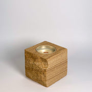 Brown 2 rck. refillable sandstone candle with rock faced side shown on the left