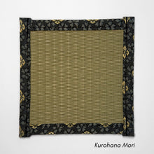 Square tatami coaster with an olive igusa centre and a deep navy border decorated with gold floral motifs.