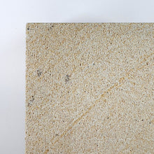 White rck. refillable sandstone candle, side face close up of the sandstone